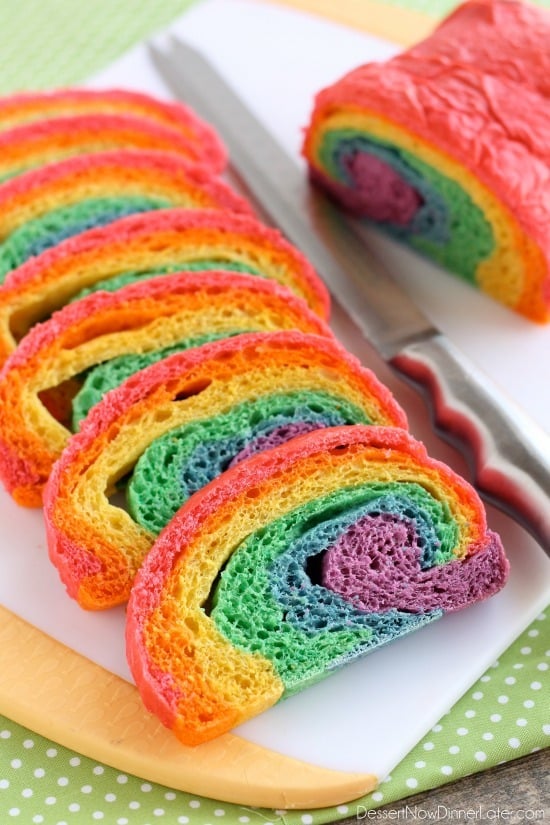 Rainbow Bread - Rhodes frozen dough is kneaded into 6 bright colors and rolled into a fun rainbow loaf (step-by-step photo instructions included). The perfect bread to eat with butter for dinner or use for breakfast french toast on St. Patrick's Day!