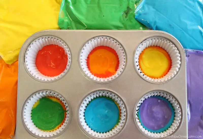 Rainbow Cupcakes - layer colored cake batter in order: red, orange, yellow, green, blue, purple.