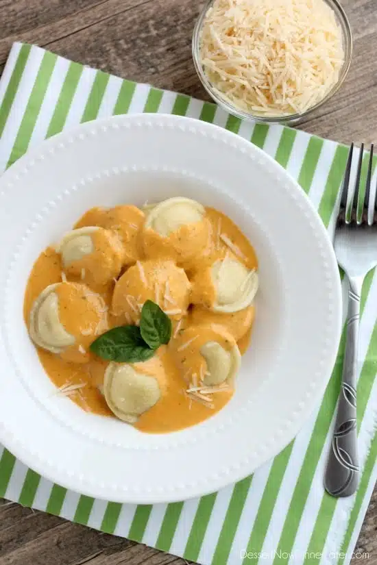 Roasted Red Pepper Ravioli - Fresh and creamy roasted red pepper sauce atop al dente cooked cheese filled ravioli, for a restaurant-quality Italian dish made easy at home!