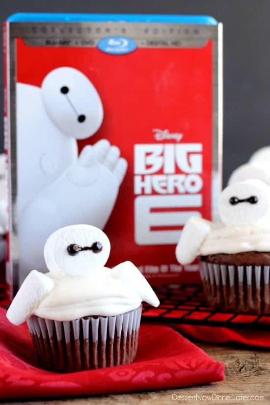 Big Hero 6 comes to life at home with these Baymax Cupcakes topped with marshmallow frosting and large marshmallows. {Step-by-Step Tutorial}