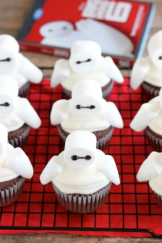 Big Hero 6 comes to life at home with these Baymax Cupcakes topped with marshmallow frosting and large marshmallows. {Step-by-Step Tutorial}