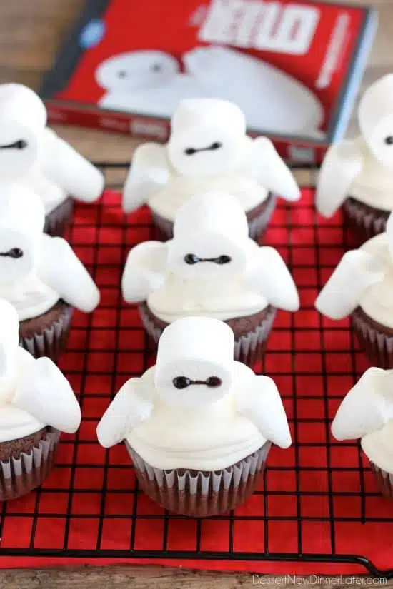 Big Hero 6 comes to life at home with these Baymax Cupcakes topped with marshmallow frosting and large marshmallows. {Step-by-Step Tutorial}