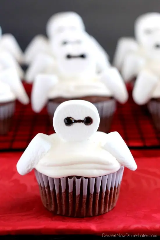 Big Hero 6 comes to life at home with these Baymax Cupcakes topped with marshmallow frosting and large marshmallows. {Step-by-Step Tutorial}
