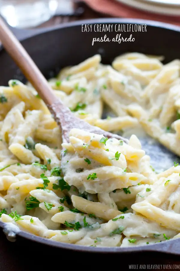 Indulge in a creamy, flavorful, and oh-so-comforting classic pasta alfredo without all the calories with this skinny version featuring cauliflower! NO cream or butter in this cozy pasta! @WholeHeavenly