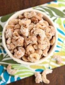 These Coconut Cashews, inspired by Trader Joe's, are made with coconut milk, coconut oil, sugar, and coconut flakes to create some incredibly delicious candied nuts!