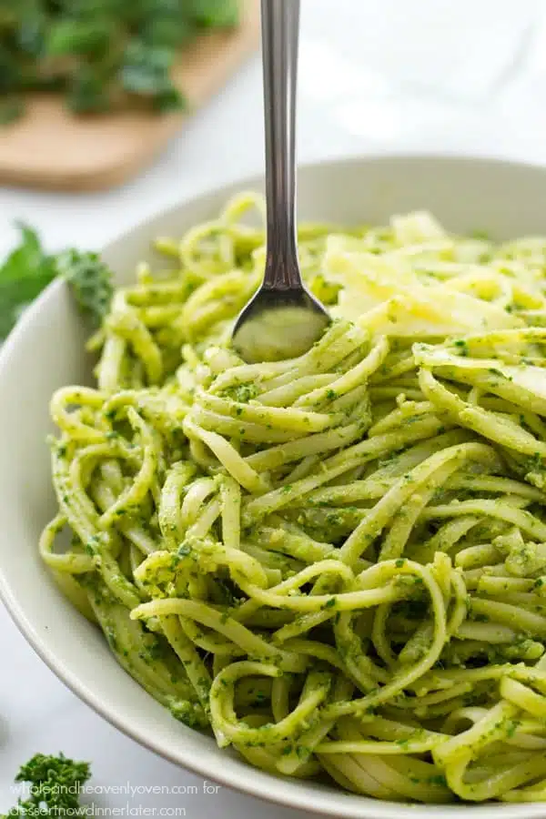 This creamy fettuccine combines the best worlds of both alfredo sauce and fresh pesto into one fresh springtime pasta side dish!