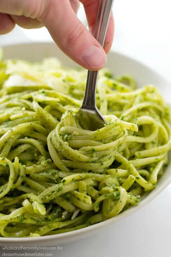 This creamy fettuccine combines the best worlds of both alfredo sauce and fresh pesto into one fresh springtime pasta side dish!