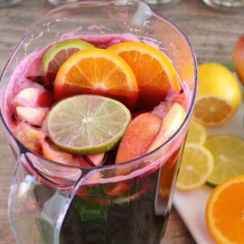 Easy Virgin Sangria - only 2 ingredients plus fresh cut fruit. A bubbly, fruity drink perfect for any party!