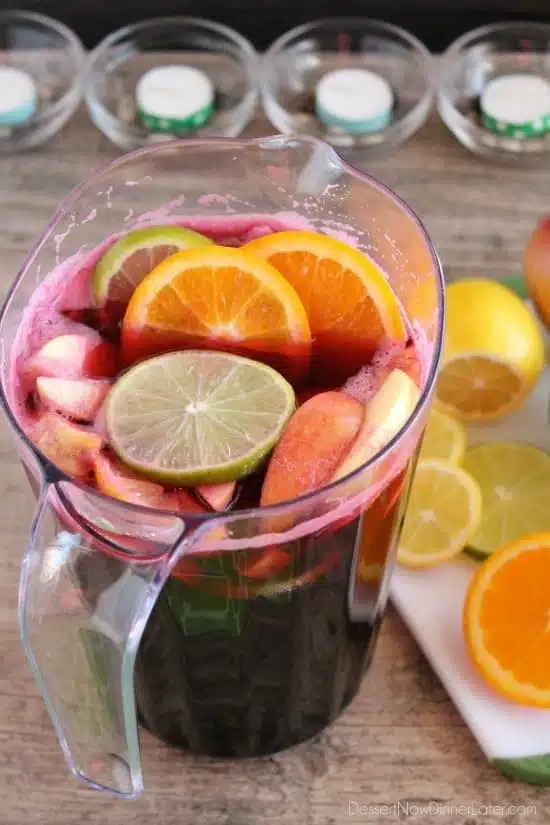 Easy Virgin Sangria - only 2 ingredients plus fresh cut fruit. A bubbly, fruity drink perfect for any party!