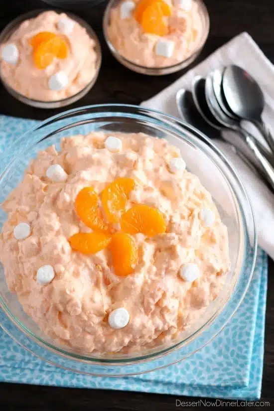 This Orange Fluff Fruit Salad can be thrown together quick, with only 6 to 7 ingredients, and is a potluck favorite!