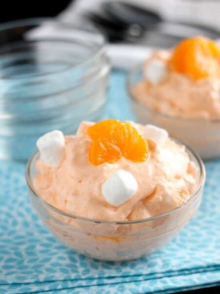 This Orange Fluff Fruit Salad can be thrown together quick, with only 6 to 7 ingredients, and is a potluck favorite!
