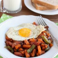 Sausage and Sweet Potato Hash is made easy with Alexia Sweet Potato Fries! Top it all off with a sunny side up egg for a great breakfast or breakfast for dinner option!