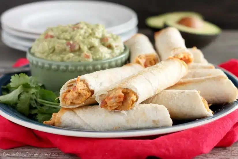 These Zesty Baked Chicken Taquitos are creamy and cheesy with a special ingredient to make them bold and zesty!  A simple guacamole recipe is also included! 