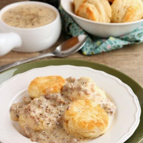 Biscuits and Gravy - a simple and spicy peppered sausage gravy atop flaky, foolproof buttermilk biscuits makes for a great breakfast or brunch!