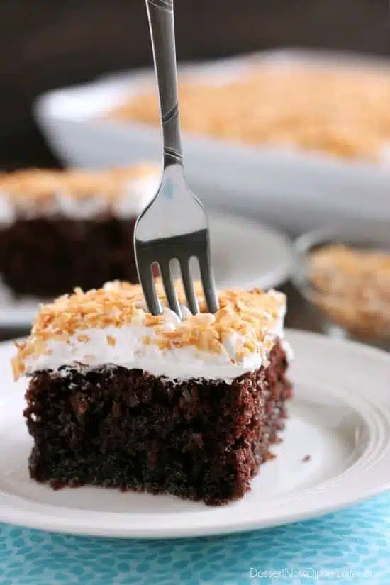 Coconut Cream Chocolate Poke Cake - an easy box cake makeover with cream of coconut, toasted coconut, and whipped cream!