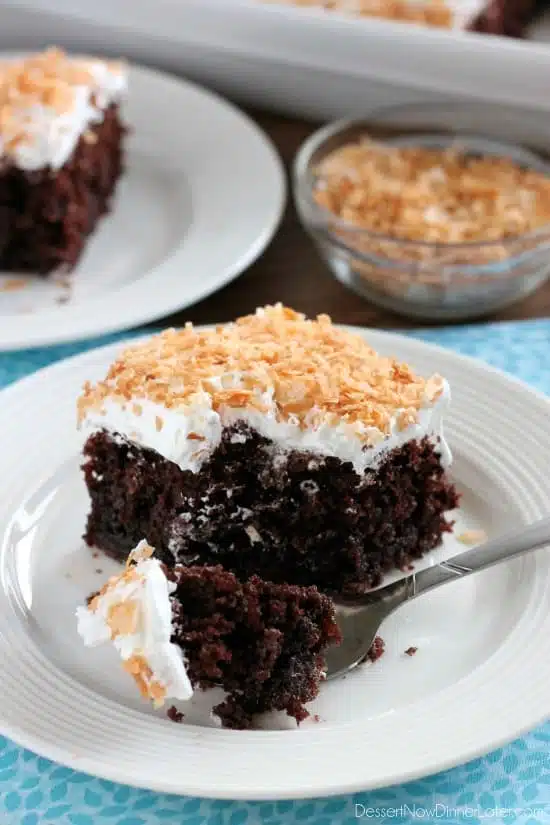 Coconut Cream Chocolate Poke Cake - an easy box cake makeover with cream of coconut, toasted coconut, and whipped cream!