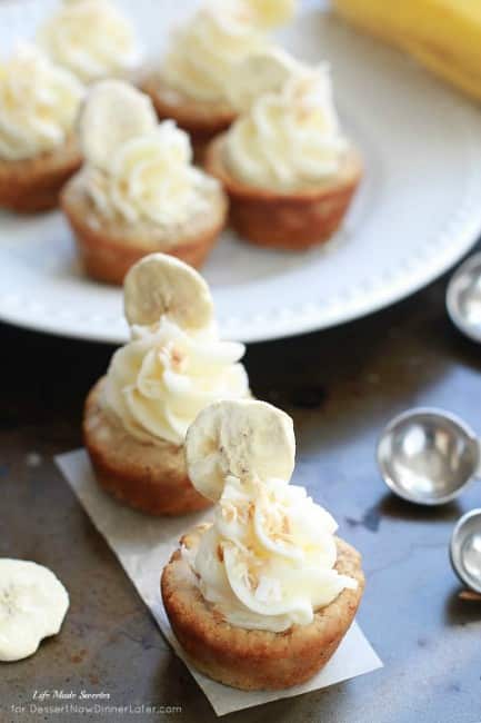 Banana Coconut Mini Cookie Cups - Tropical inspired coconut cookie cups filled with sliced bananas and topped with a swirled coconut buttercream frosting.