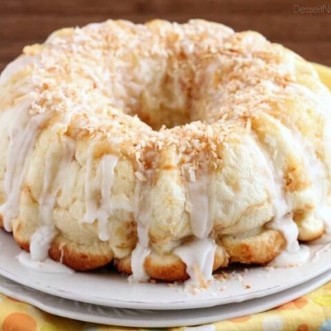 Pina Colada Monkey Bread - toasted coconut, crushed pineapple, and a secret ingredient combine together to make this sticky pull apart bread a tropical treat!