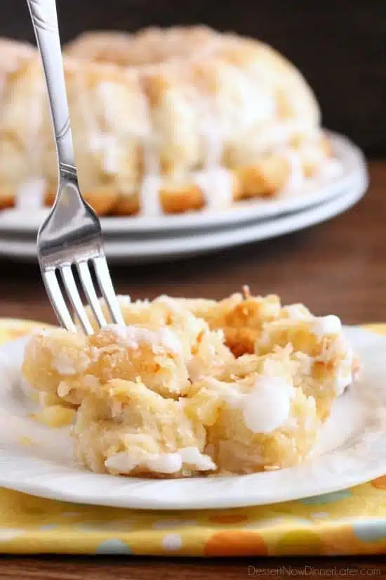 Pina Colada Monkey Bread - toasted coconut, crushed pineapple, and a secret ingredient combine together to make this sticky pull apart bread a tropical treat!