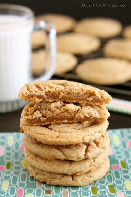 These Thick and Chewy Peanut Butter Cookies are slightly crisp on the outside, tender and soft on the inside, plus you just scoop and bake them! No rolling in sugar and pressing with a fork required!