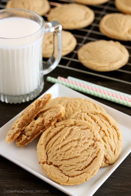 These Thick and Chewy Peanut Butter Cookies are slightly crisp on the outside, tender and soft on the inside, plus you just scoop and bake them! No rolling in sugar and pressing with a fork required!