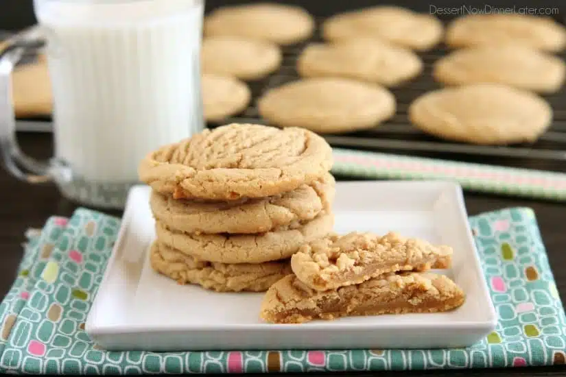 These Thick and Chewy Peanut Butter Cookies are slightly crisp on the outside, tender and soft on the inside, plus you just scoop and bake them! No rolling in sugar and pressing with a fork required!