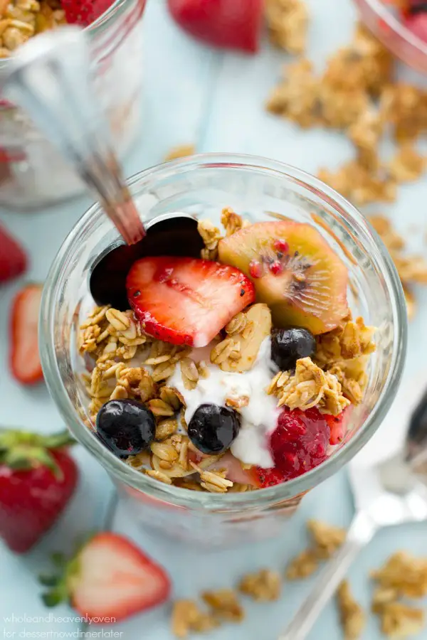 These pretty granola parfaits are loaded with a triple-delight of juicy berries, crispy granola, and the best coconut yogurt you'll ever taste. Destined to become your new go-to breakfast!