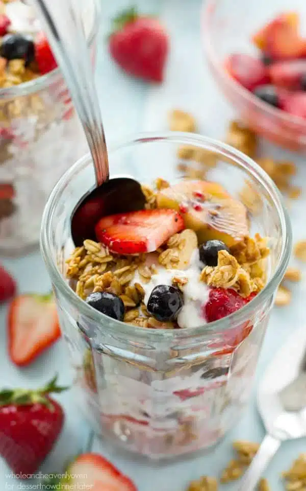 These pretty granola parfaits are loaded with a triple-delight of juicy berries, crispy granola, and the best coconut yogurt you'll ever taste. Destined to become your new go-to breakfast!