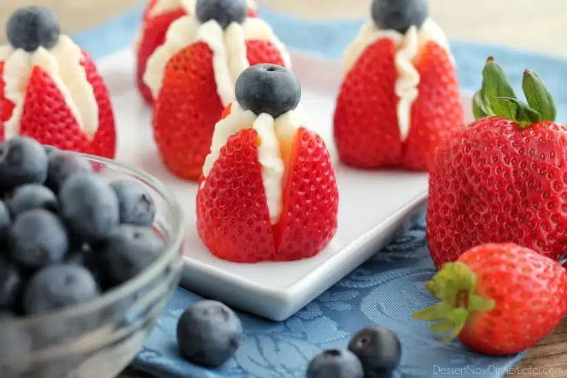 Try these easy red, white, and blue Cheesecake Stuffed Strawberries for a healthier patriotic dessert!