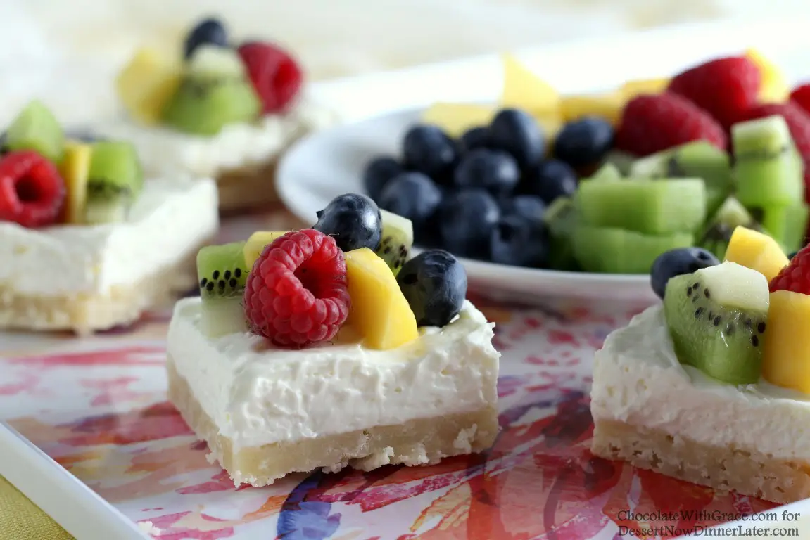 These Fruit Cheesecake Bars have a tender shortbread crust that is topped with a creamy no-bake cheesecake layer that's piled high with fresh fruit.