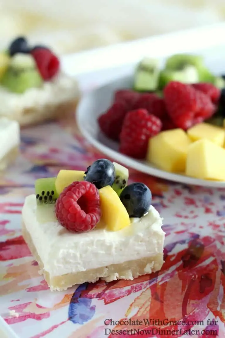 These Fruit Cheesecake Bars have a tender shortbread crust that is topped with a creamy no-bake cheesecake layer that's piled high with fresh fruit.