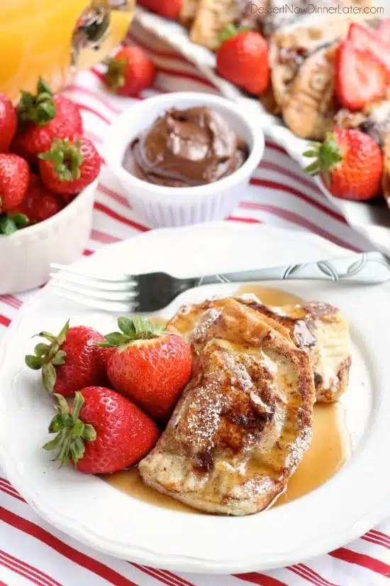 Fresh strawberries and Nutella are hidden inside this Stuffed French Toast recipe that's easy enough for the kids to help make!