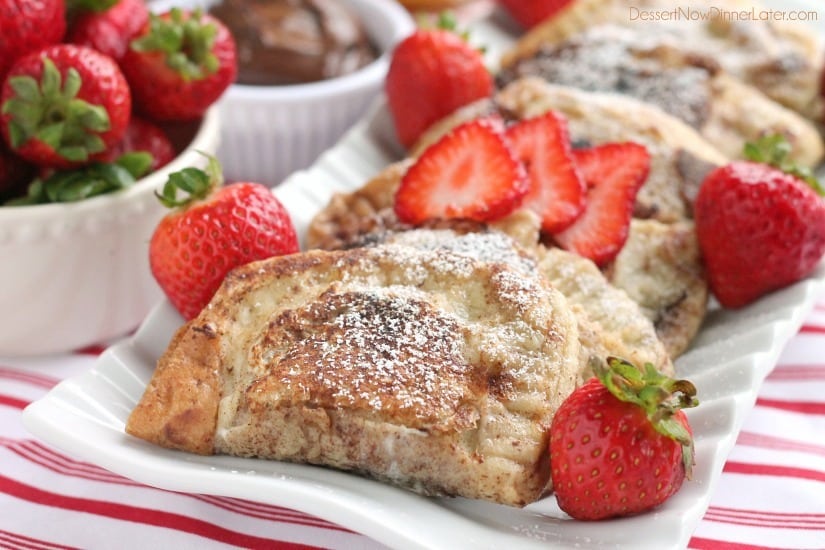 Fresh strawberries and Nutella are hidden inside this Stuffed French Toast recipe that's easy enough for the kids to help make!