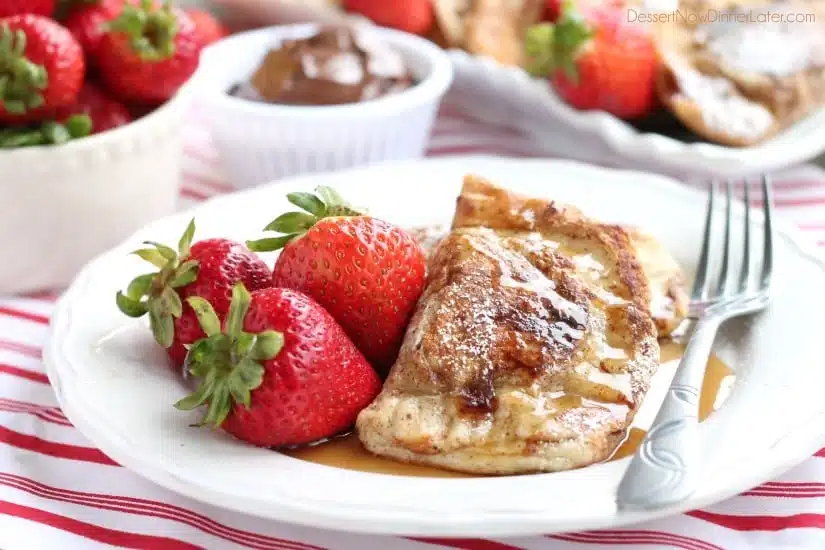 Fresh strawberries and Nutella are hidden inside this Stuffed French Toast recipe that's easy enough for the kids to help make!