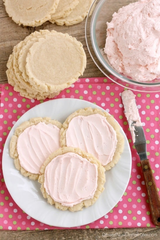 The ingredients list might surprise you with these scoop, press, and bake rustic-looking sugar cookies.  With a soft, sweet, melt-in-your-mouth cookie base, topped with a smooth and dreamy buttercream frosting -- these really are the BEST sugar cookies you will make at home!