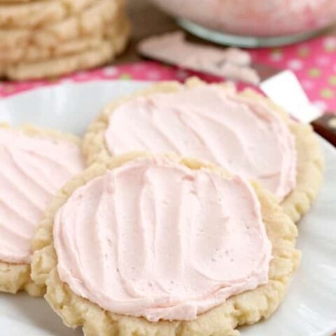 The ingredients list might surprise you with these scoop, press, and bake rustic-looking sugar cookies. With a soft, sweet, melt-in-your-mouth cookie base, topped with a smooth and dreamy buttercream frosting -- these really are the BEST sugar cookies you will make at home!