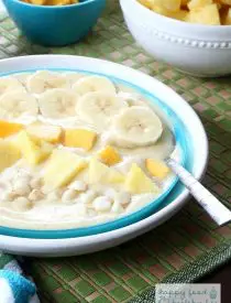 This tropical smoothie bowl is perfect for when you want the flavors of a smoothie but don't necessarily want to drink your breakfast. And the flavors will take you right to the beach!