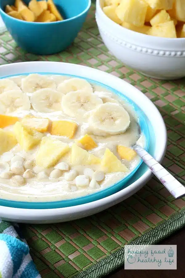 This tropical smoothie bowl is perfect for when you want the flavors of a smoothie but don't necessarily want to drink your breakfast. And the flavors will take you right to the beach!