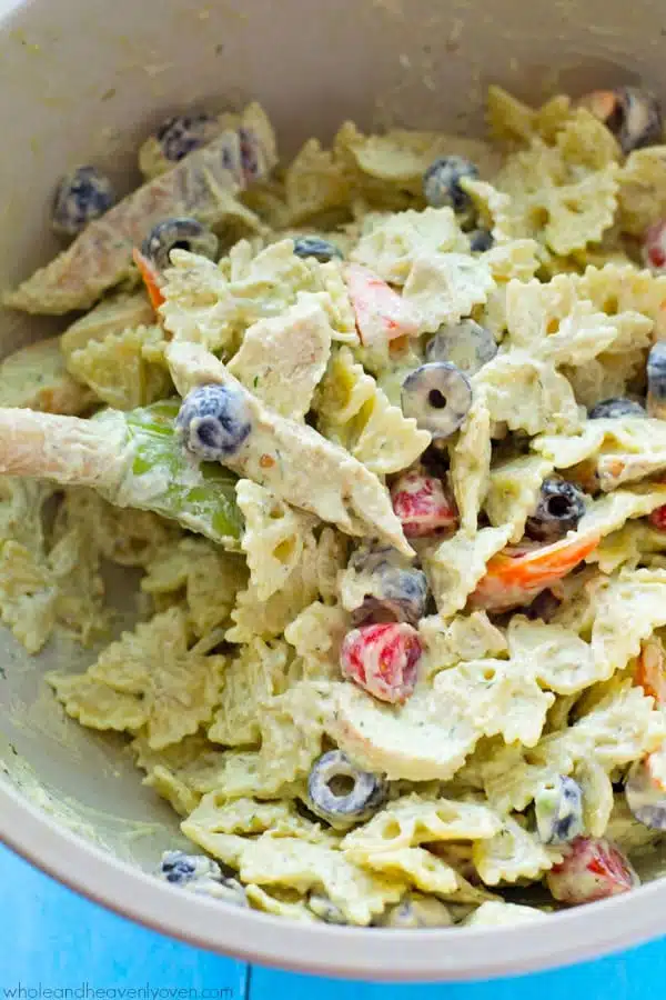 This creamy pasta salad is jam-packed with juicy grilled chicken, a rainbow of colorful veggies, and a light, flavorful homemade avocado ranch dressing. Bring this salad to any picnic and watch it vanish!