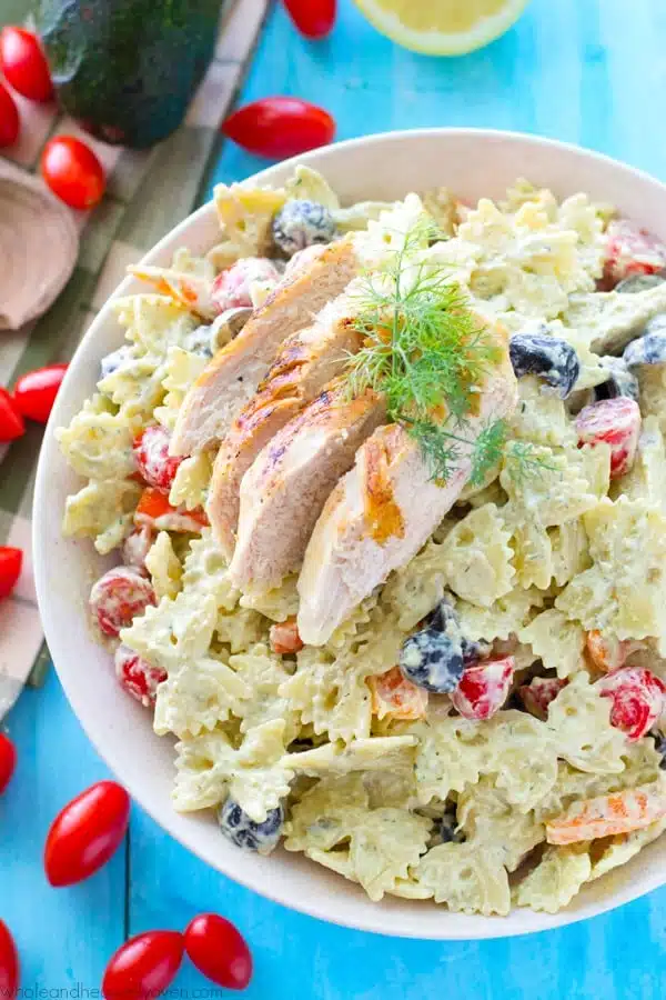 This creamy pasta salad is jam-packed with juicy grilled chicken, a rainbow of colorful veggies, and a light, flavorful homemade avocado ranch dressing. Bring this salad to any picnic and watch it vanish!