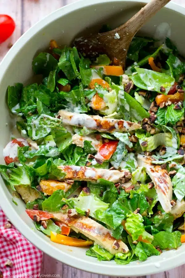 Grilled ranch-marinated chicken, a rainbow of fresh veggies and lots of ranch dressing collide in this simple, flavor-loaded chopped salad. ---soon to be your new favorite summer salad! @WholeHeavenly