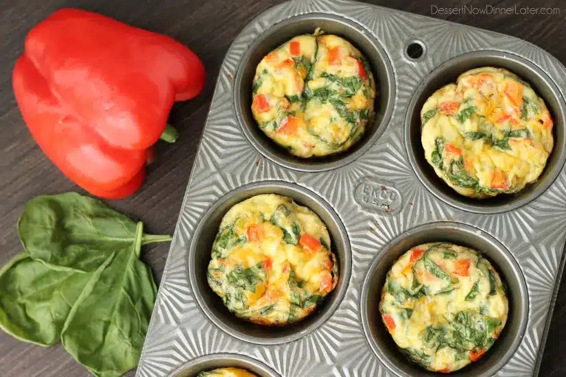 These Breakfast Egg Cups are the perfect go-to breakfast when you are on-the-go! Great for school day mornings and busy schedules. Bake a lot and store them in the fridge or freezer to re-heat and eat throughout the week!