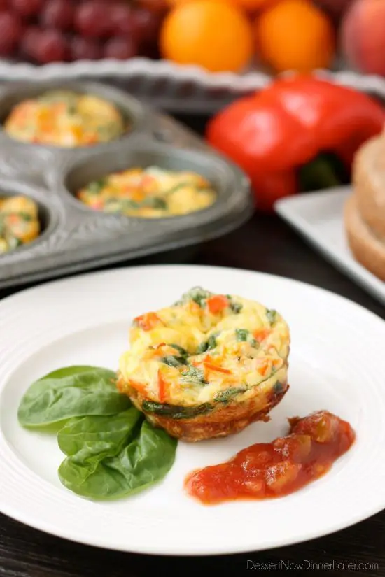 These Breakfast Egg Cups are the perfect go-to breakfast when you are on-the-go! Great for school day mornings and busy schedules. Bake a lot and store them in the fridge or freezer to re-heat and eat throughout the week!