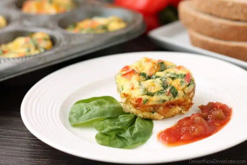 These Breakfast Egg Cups are the perfect go-to breakfast when you are on-the-go! Great for school day mornings and busy schedules. Bake a lot and store them in the fridge or freezer to re-heat and eat throughout the week!