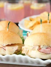 Cordon Bleu Sliders are made easy with deli meats, swiss cheese, honey dijon mayo, and freshly baked Rhodes® dinner roll slider buns!