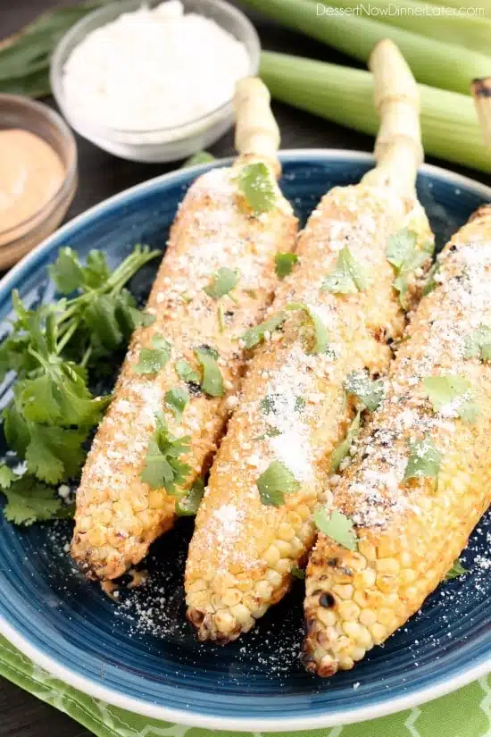 This Mexican Corn on the Cob is grilled and slathered in a chili-lime mayo. Finish it off with a sprinkle of cheese and you won't want corn on the cob any other way!