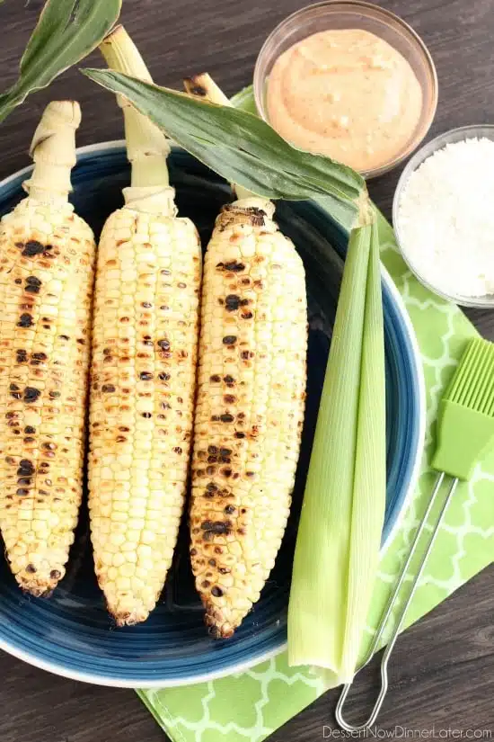 This Mexican Corn on the Cob is grilled and slathered in a chili-lime mayo. Finish it off with a sprinkle of cheese and you won't want corn on the cob any other way!