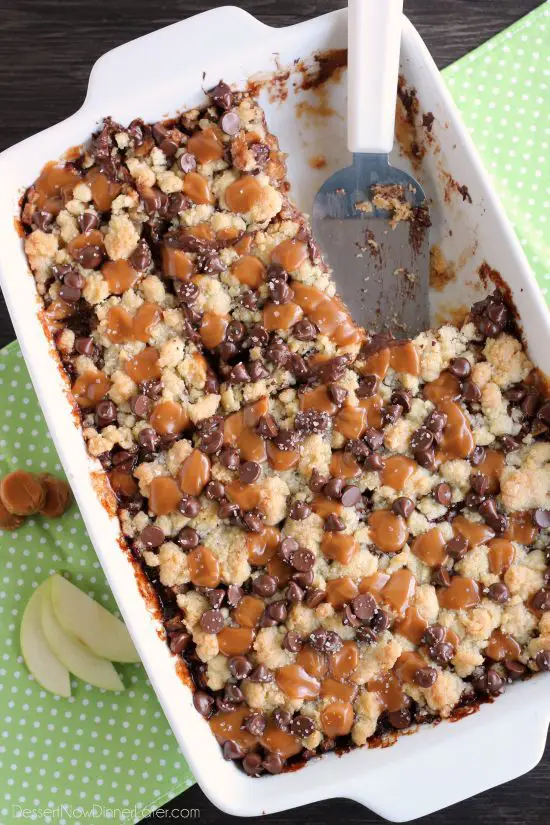Chocolate Caramel Apple Crumb Bars - These dessert bars have a buttery crust and crumble on top, a gooey cinnamon-sugar apple filling, with caramels, chocolate chips, and sea salt sprinkled on top.