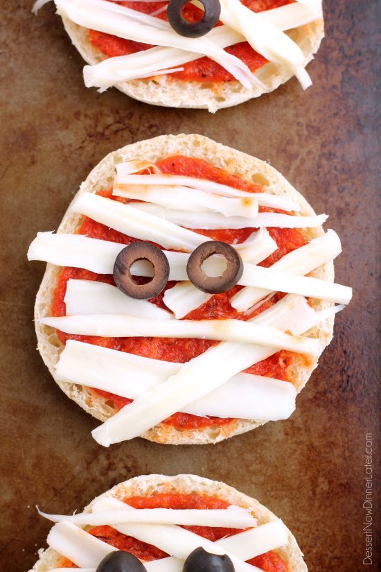 Mini Mummy Pizzas are a fun and easy food the kids can make for Halloween!
