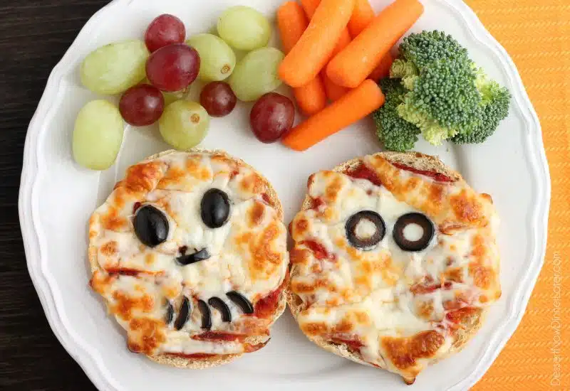 Mini Mummy Pizzas are a fun and easy food the kids can make for Halloween!